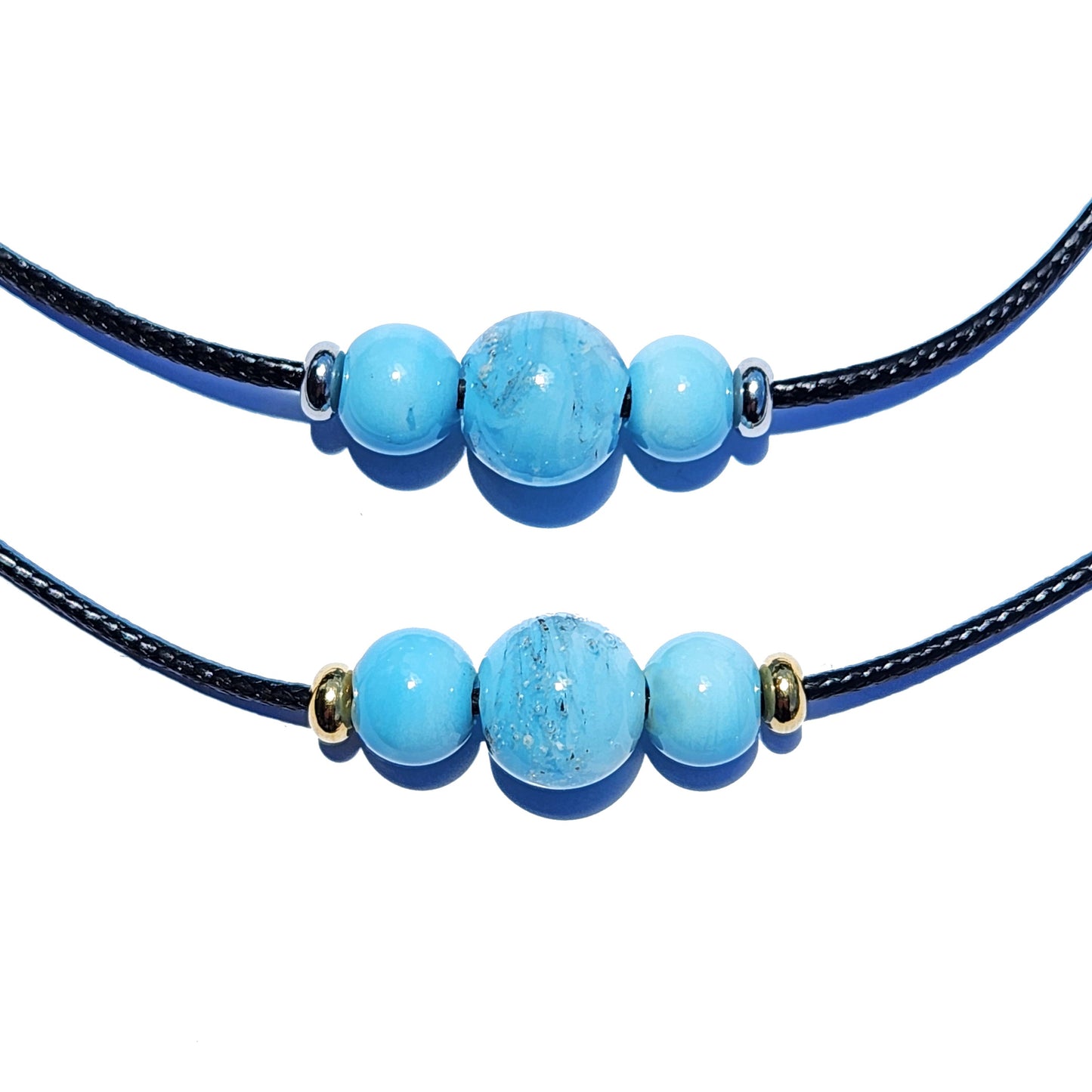 Forever Close Ashes Necklace with ash-infused blue glass beads on adjustable black cord with silver and gold hardware.