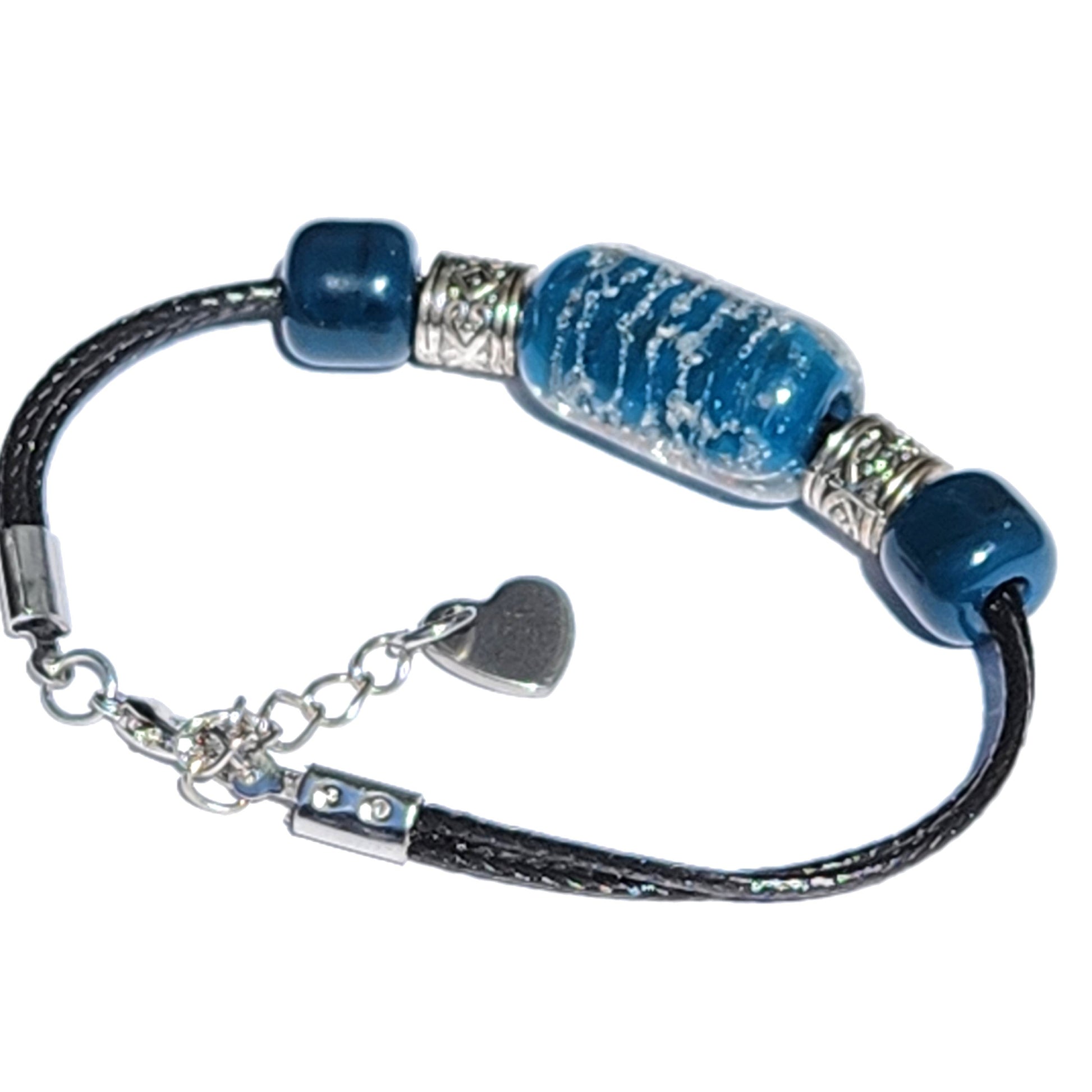 Blue Remember Me cremation bracelet with ashes, featuring silver heart charm and stainless steel accents. Custom memorial jewelry for daily remembrance.