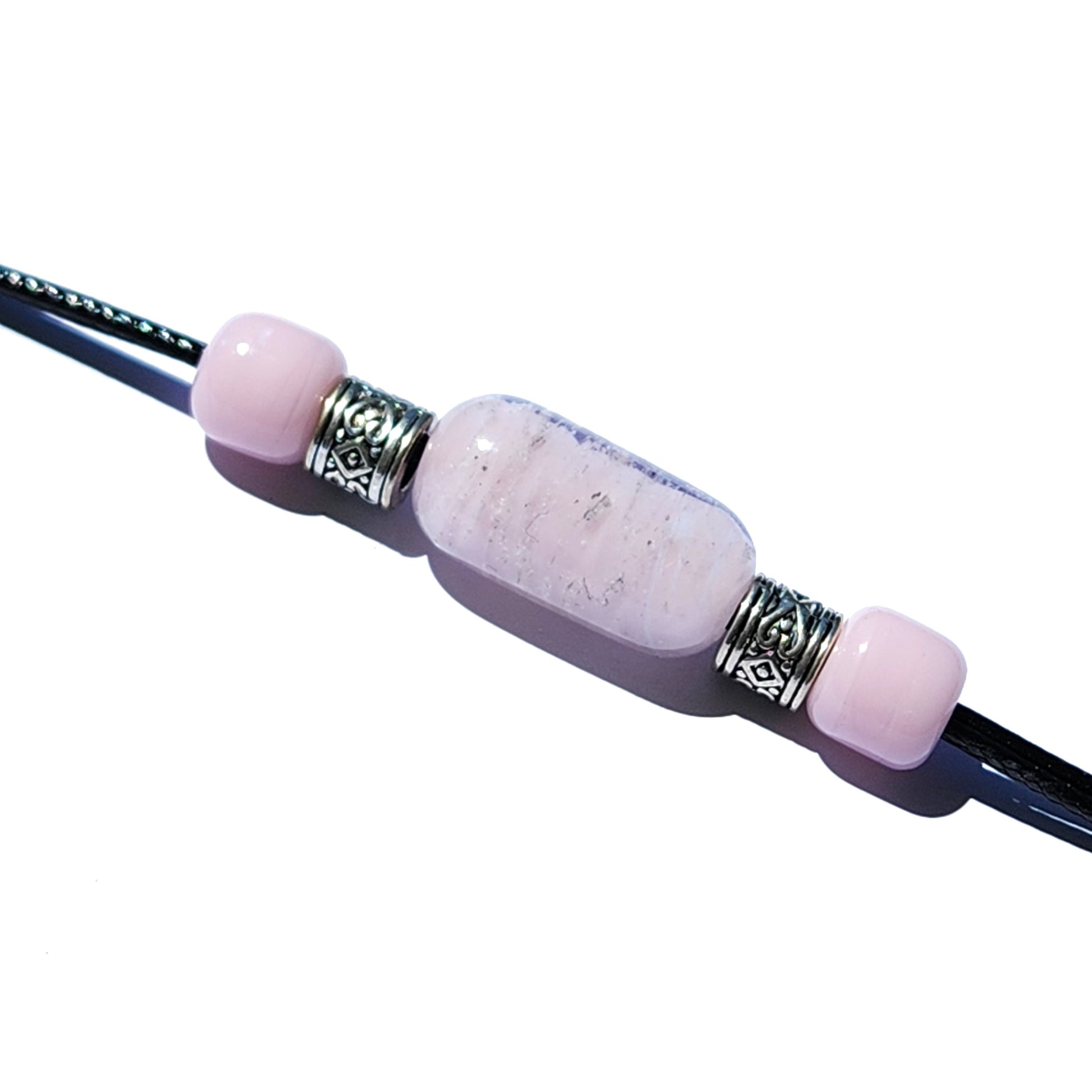 Remember Me cremation bracelet with ashes in pink glass beads and silver accents on black cord. Memorial urn jewelry for daily remembrance wear.