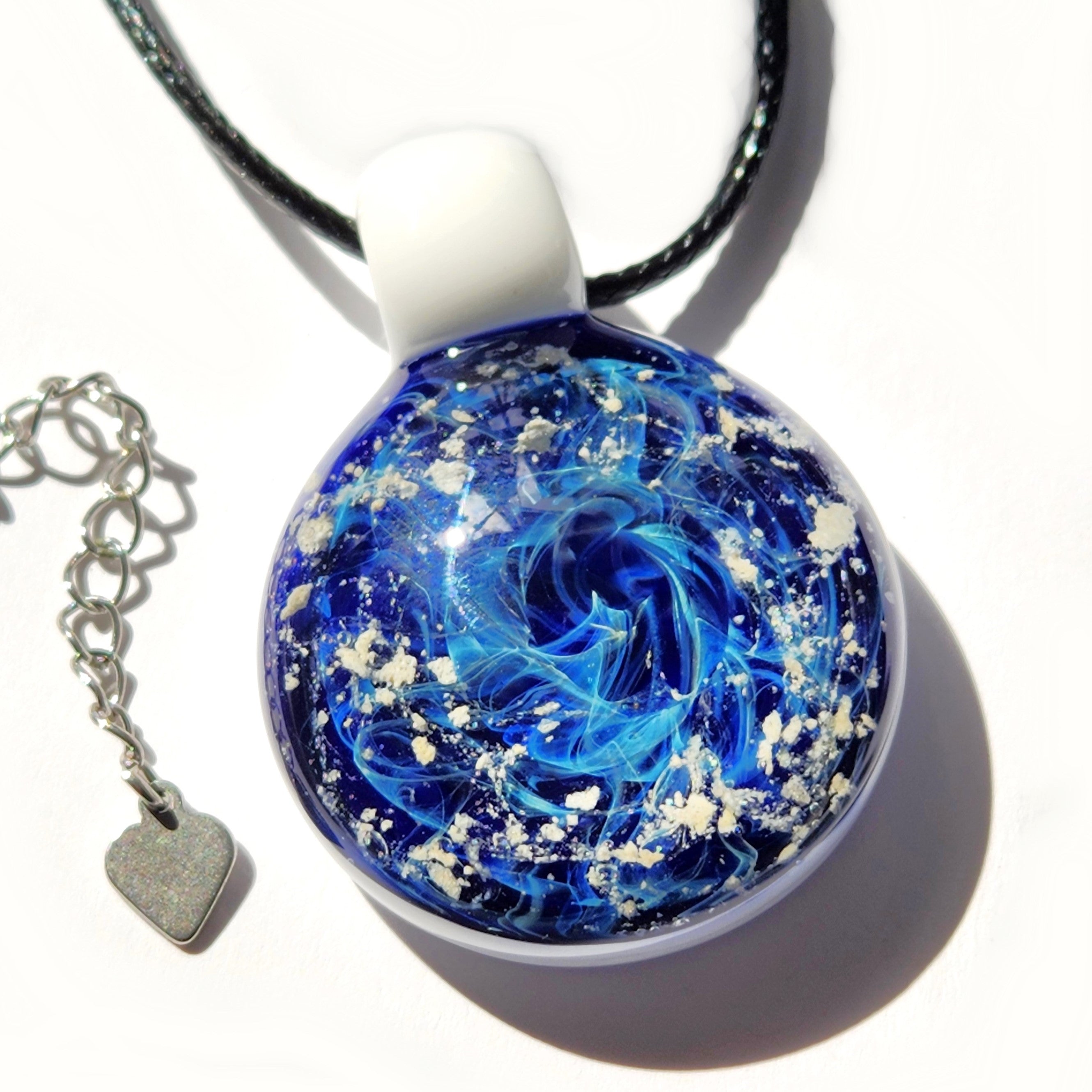 Handmade from glass cremation pendant with ashes mixed in with pure silver by DragonFire Glass