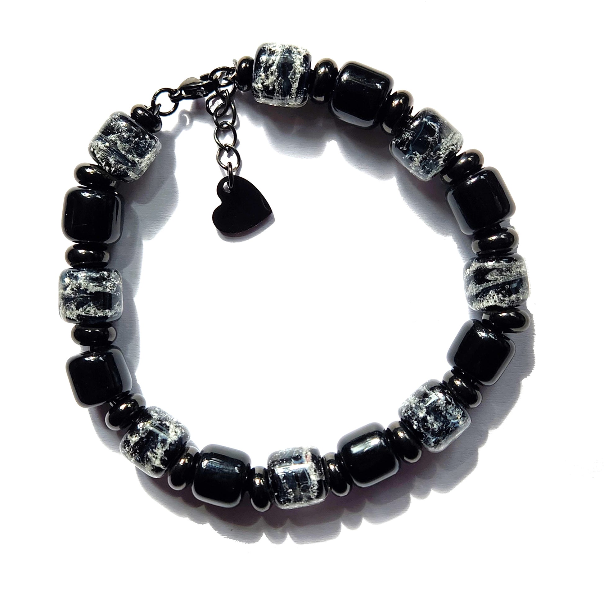 Black Memorial Bracelet for Men featuring handmade ash-infused glass beads and stainless steel accents. A unique cremation bracelet from the Eternal Collection.