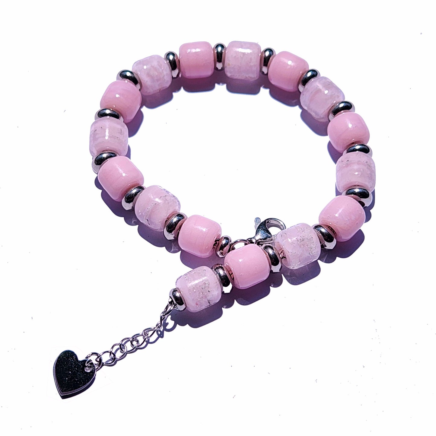 Custom Ashes Memorial Bracelet in pink with silver spacers and heart charm. Personalized cremation jewelry gift for honoring loved ones.
