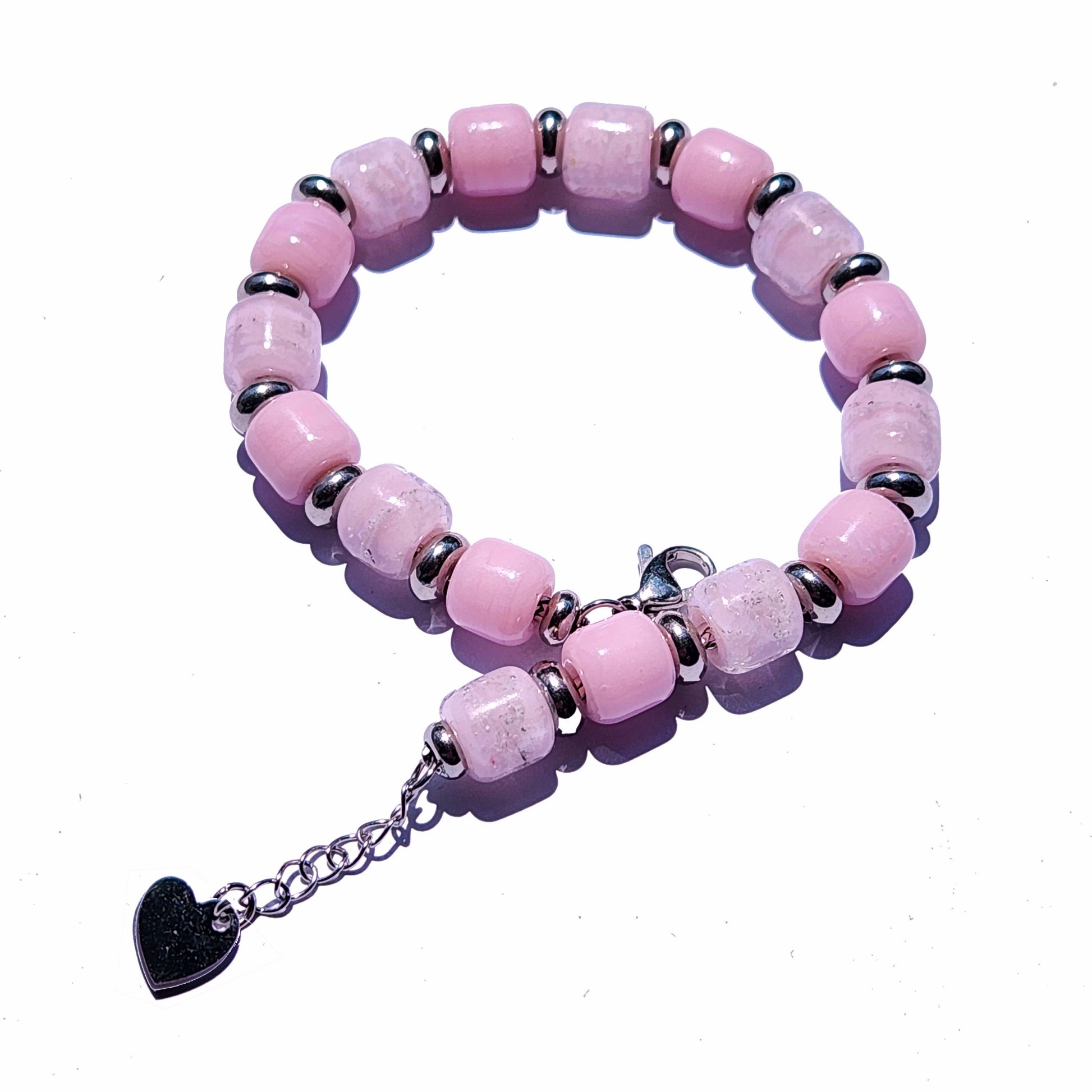 Custom Ashes Memorial Bracelet in pink with silver spacers and heart charm. Personalized cremation jewelry gift for honoring loved ones.