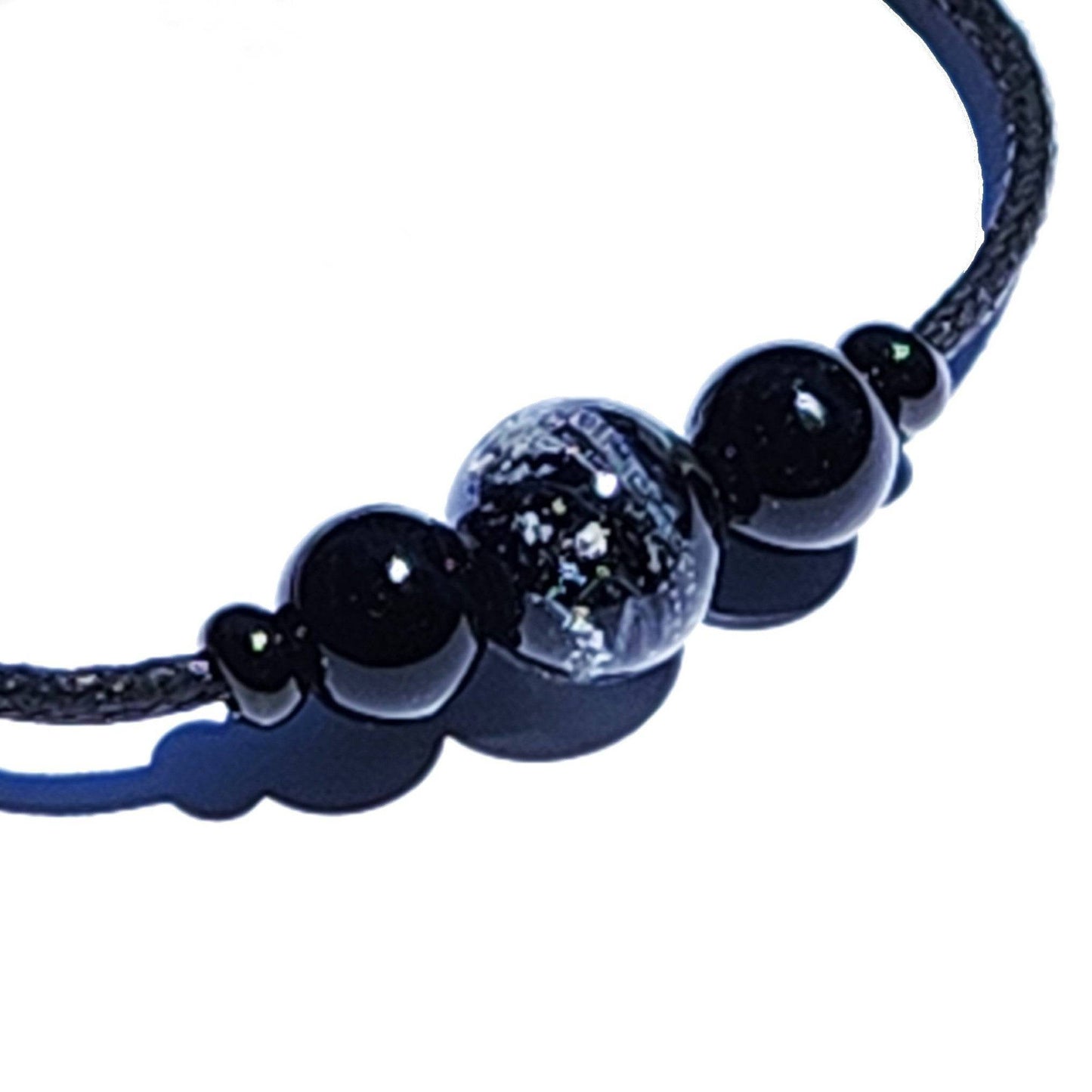 Black Forever Close Ashes Necklace with glossy cremation beads and ash-infused center. Elegant handmade memorial keepsake.