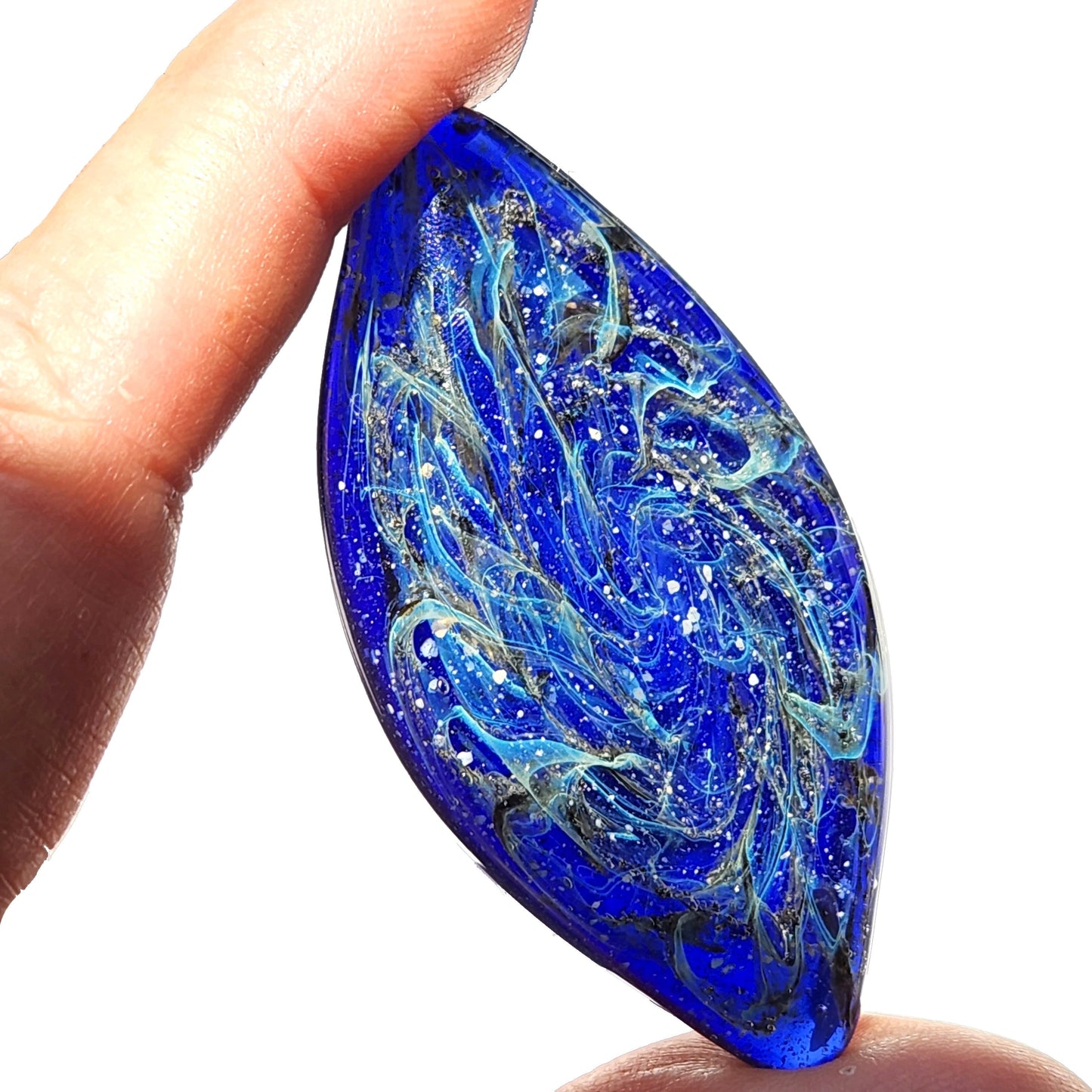 Galaxy Cremation Touchstone | Memorial Glass Keepsake with Ashes in deep blue and turquoise swirls, handcrafted for remembrance ceremonies.