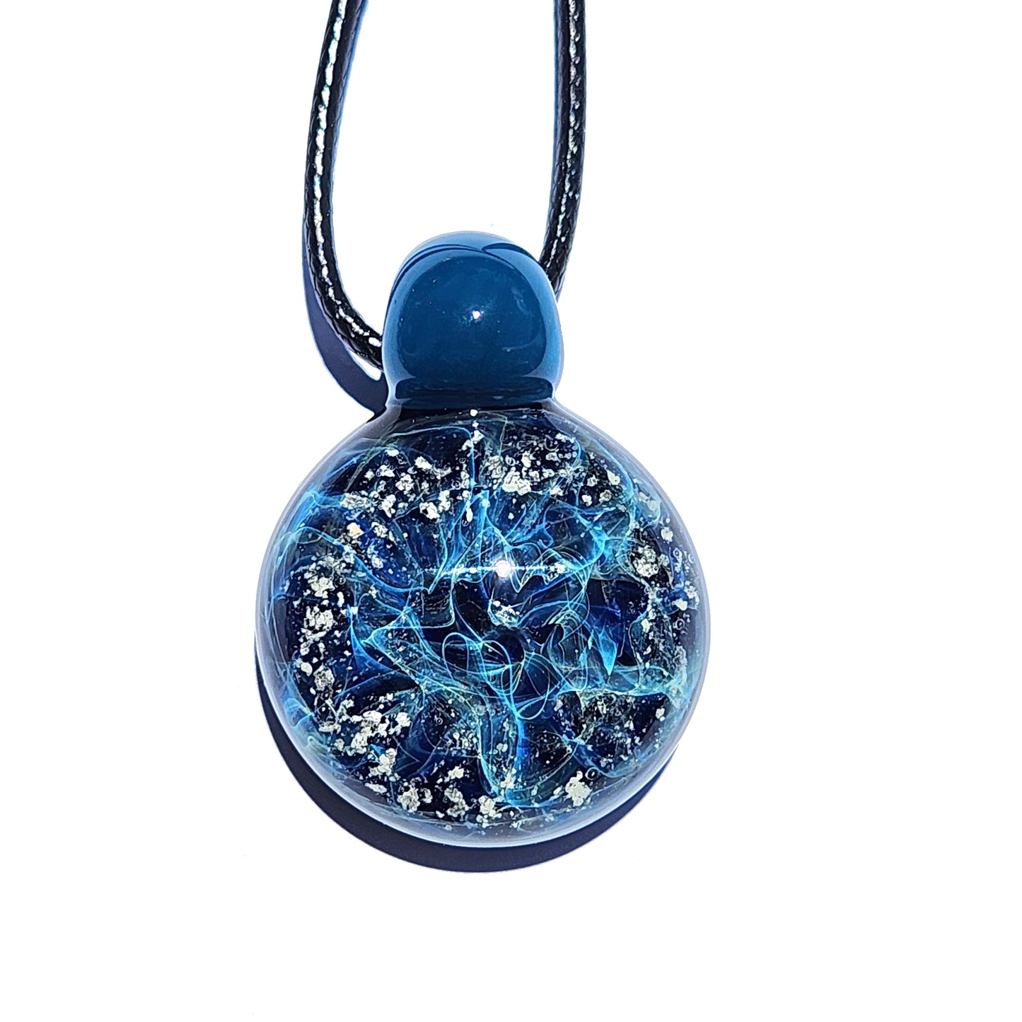 Galaxy Mini Glass Cremation Pendant featuring swirling blue and silver galaxy design, handmade with ashes for memorial jewelry keepsake.