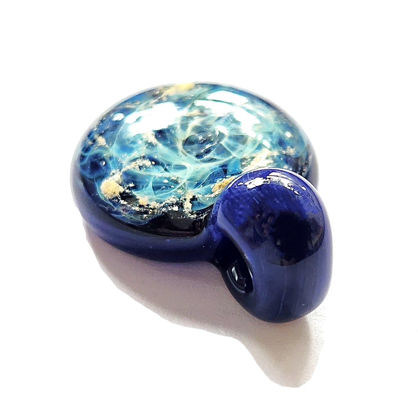 Galaxy Cremation Pendant – Handmade Ashes Memorial Necklace featuring a swirling blue and white glass design with embedded ashes and silver accents.