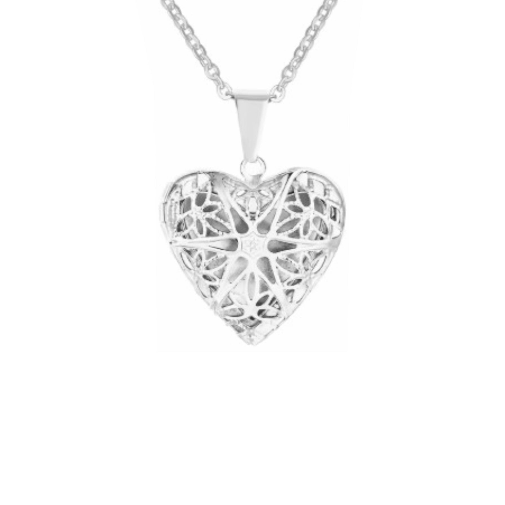 Heart of Remembrance Memorial cremation pendant in silver with intricate rose detail, designed to hold ashes in a heart-shaped stainless steel urn.