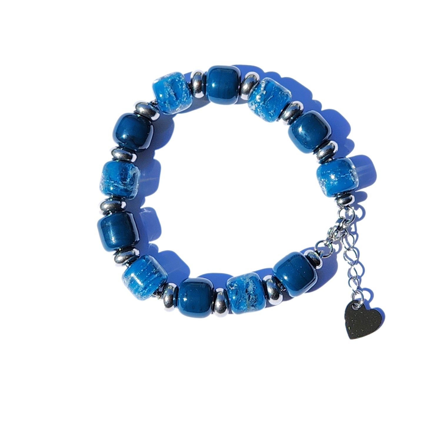 Ocean Blue Memorial Bracelet featuring ash-infused glass cremation beads and stainless steel spacers. Handmade tribute jewelry for memorial ceremonies.