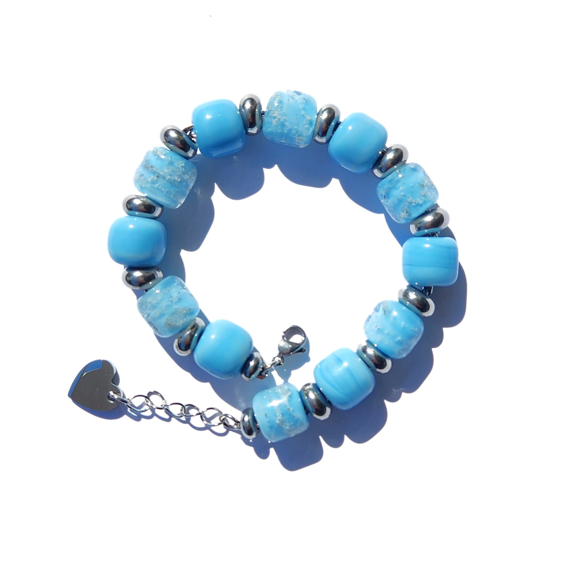 Sky Blue Cremation Bracelet with silver chain and ash-infused beads, a handcrafted memorial piece from DragonFire.
