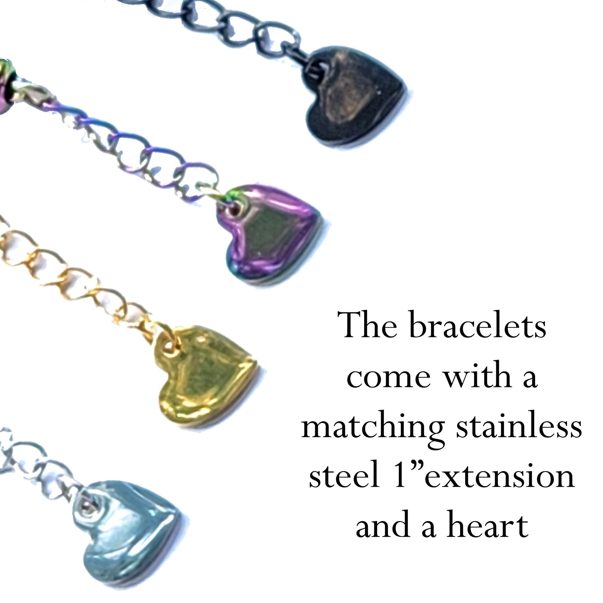 Heart-shaped stainless steel charms in silver, gold, black, and multicolor, included with Sky Blue Memorial Bracelets by DragonFire.