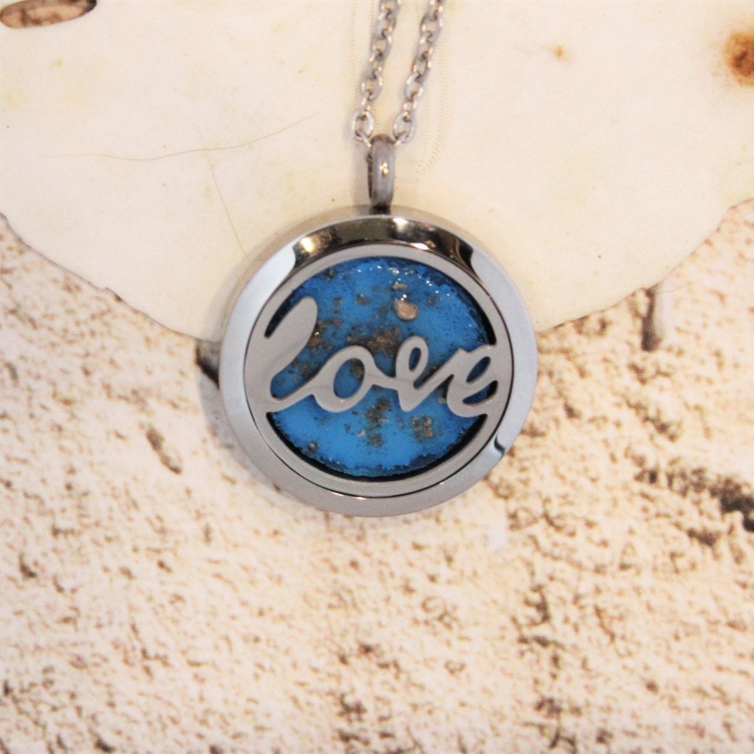 Stainless Steel Cremation Pendant – Ashes in Resin with 'Love' Pendant