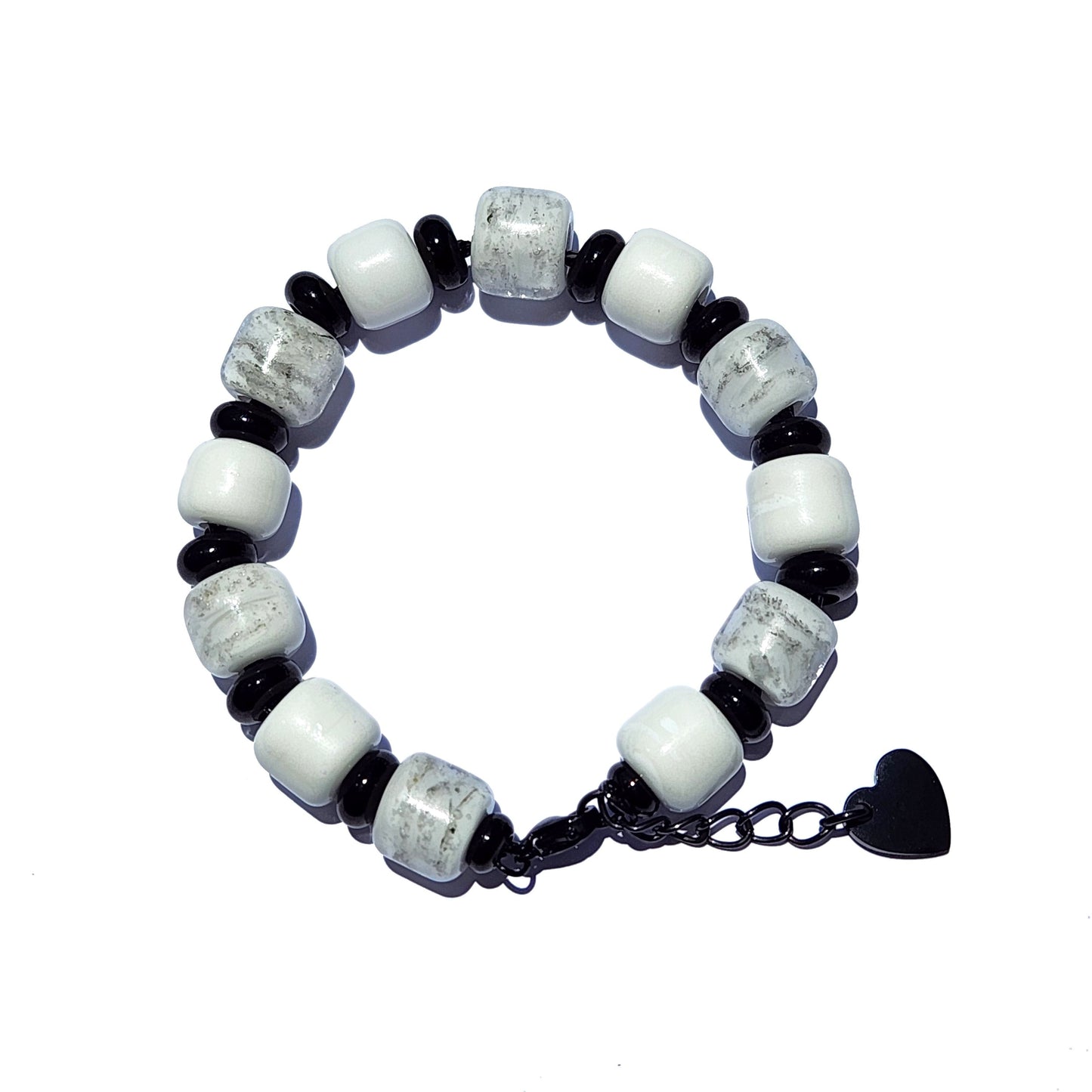 White Cremation Bracelet from the Eternal Collection featuring ash-infused white beads and black spacers, ideal memorial jewelry for men and women.