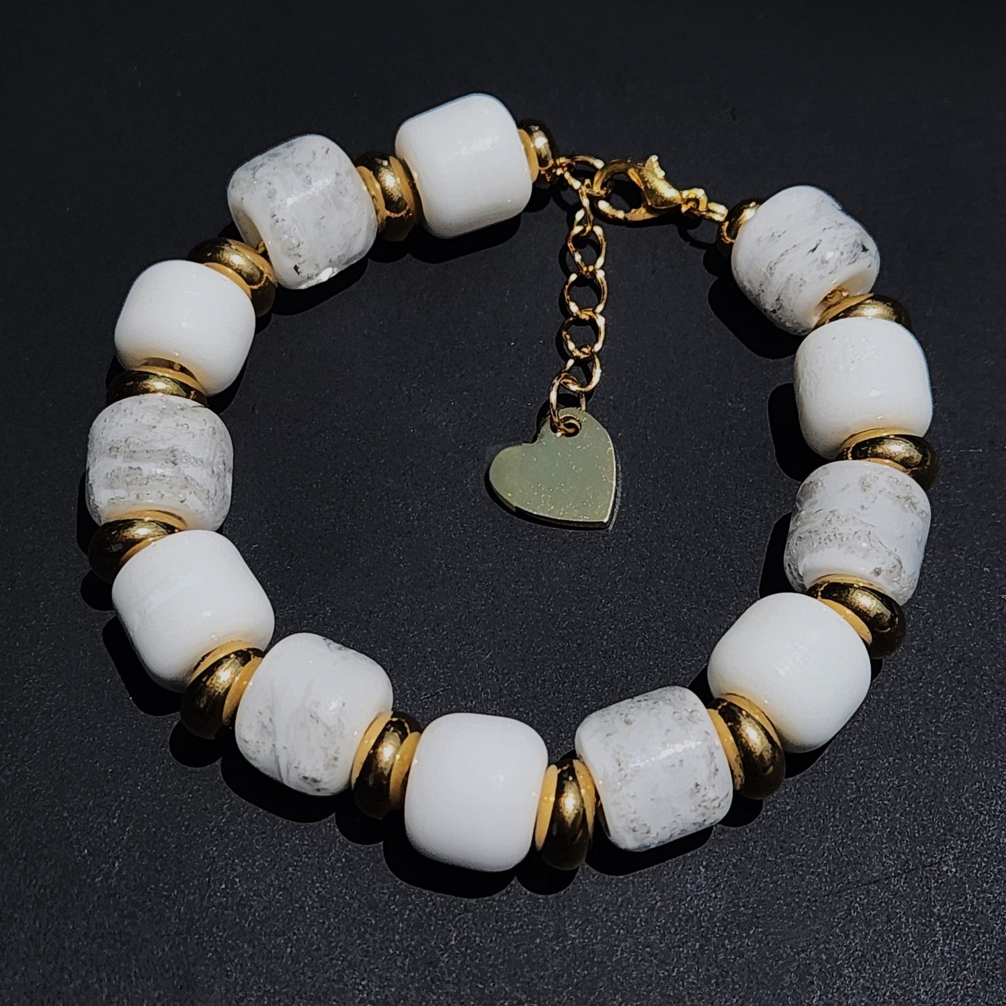 White Cremation Bracelet from the Eternal Collection featuring ash-infused white beads and gold accents, ideal memorial jewelry for men and women.