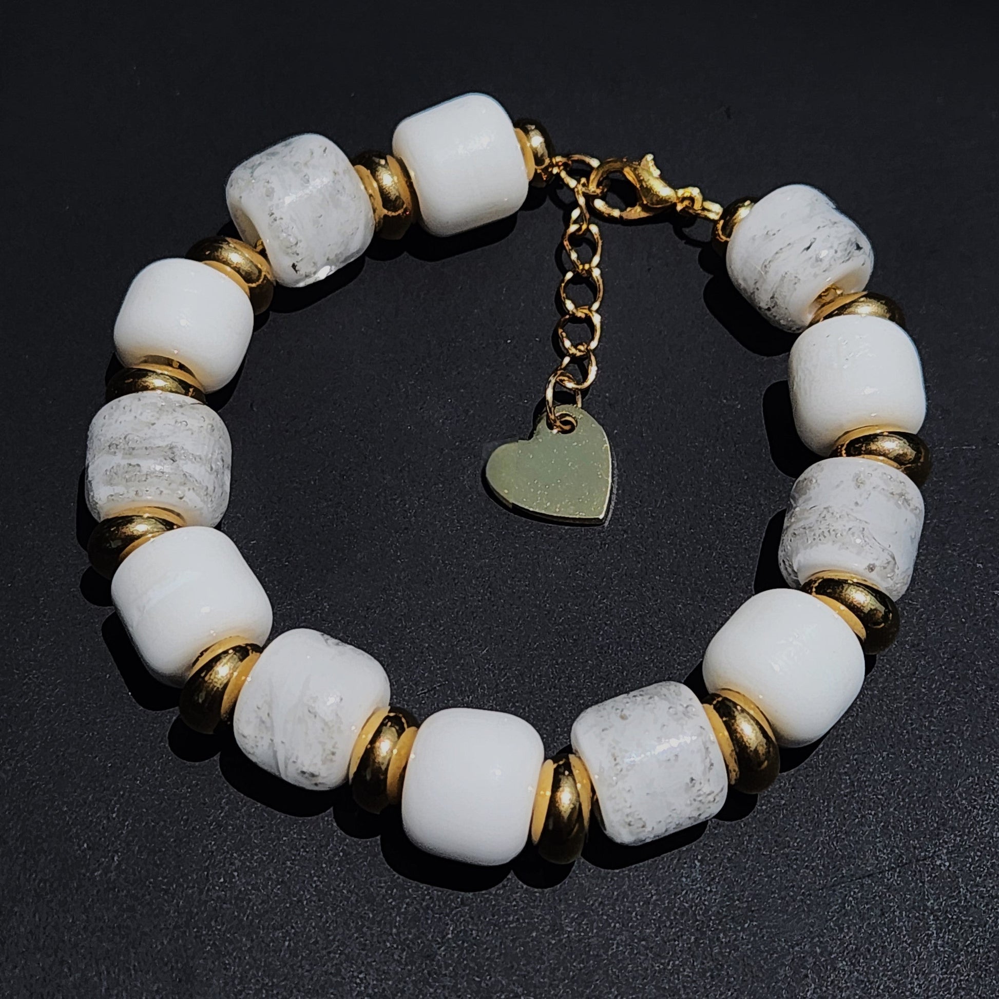 White Cremation Bracelet from the Eternal Collection featuring ash-infused white beads and gold accents, ideal memorial jewelry for men and women.